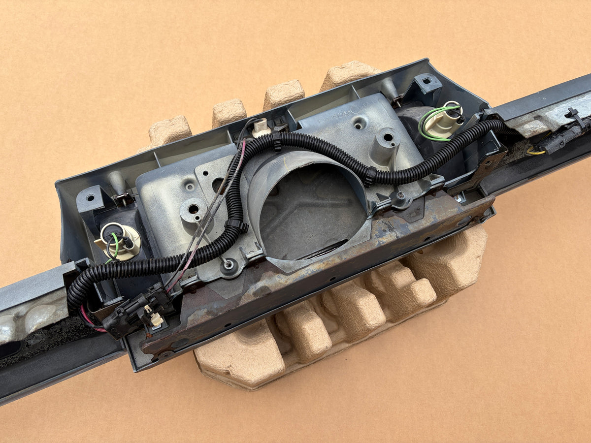 1980-1992 Cadillac Fleetwood Deville Brougham Trunk License Filler, Bracket, Reverse Light Assembly